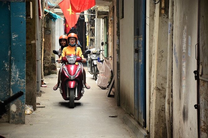 Hanoi Motorbike Tours Led By Women: Hanoi City Insight Motorbike Tours - Huu Truc Bach and the final food stop