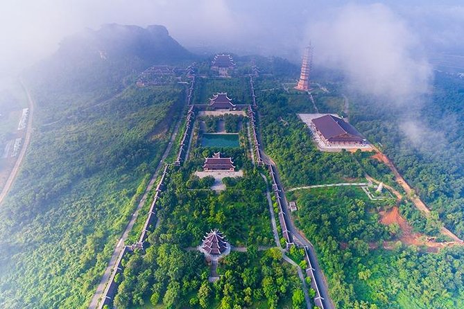 Hanoi - Ninh Binh Day Trip - The cultural balance: giant statue, old province, natural waterways