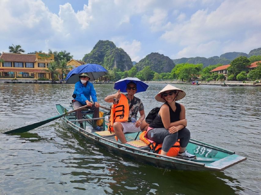 Hanoi: Ninh Binh, Hoa Lu, Tam Coc and Mua Cave Day Trip - Tam Coc by sampan, with limestone peaks overhead