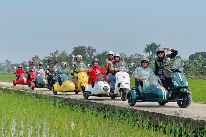Hanoi Sidecar Tour: Hanoi Countryside Food, Culture & Daily Life - Leaving Hanoi by Vespa sidecar