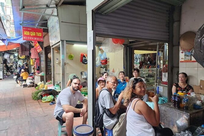 Hanoi Street Food Tour with egg coffee making - Grilled pork, rice noodles, and fresh herbs