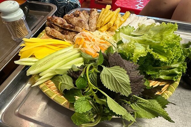 Hanoi Walking Street Food Tour with Train Street - Eating on the street, not in a formal dining room