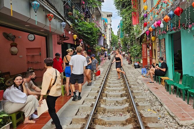 Hanoi Walking Street Food Tour with Train Street - Group size, timing, and pickup details