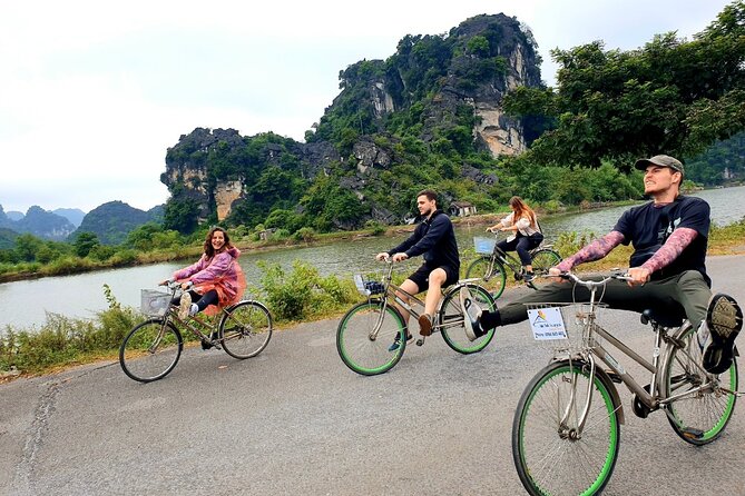 Highlight Ninh Binh Full Day Tour Tam Coc Boat, Mua Cave, Hoa Lu - Tam Coc by bamboo boat