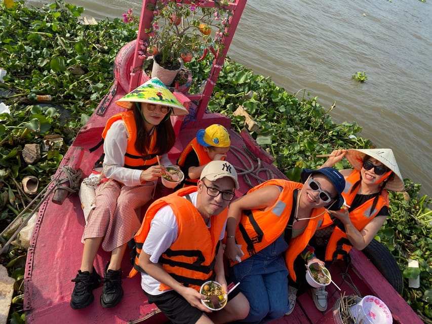 Ho Chi Minh: 1-Day Mekong Delta Tour-Floating Market & Islet - Fruit gardens, monkey bridges, and family food