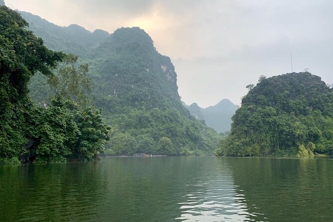 Hoa Lu - Tam Coc - Mua Cave Full Day - LIMOUSINE - Cycling through the Ninh Binh countryside