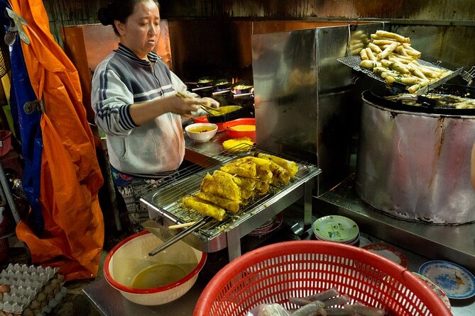 Hoi An at Sunset: Authentic Local Street Food Tour - Banh mi first, with a stop at a long-running bakery