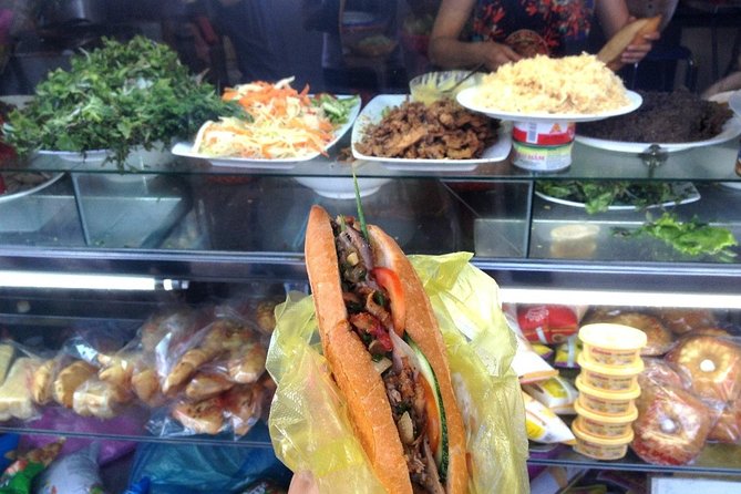 Hoi An at Sunset: Authentic Local Street Food Tour - Cao lau or chicken rice at a local restaurant