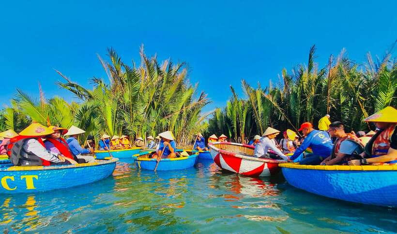 Hoi An: Coconut Basket Boat Rides with Two-way Transfers - Learning to paddle and racing the boats