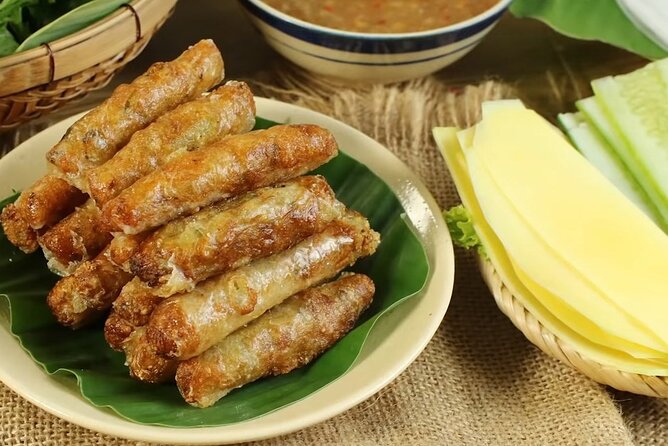 Hoi An Vespa Food Tour: Authentic & Exotic Food Culture - Tan An starts the meal with grilled rice paper