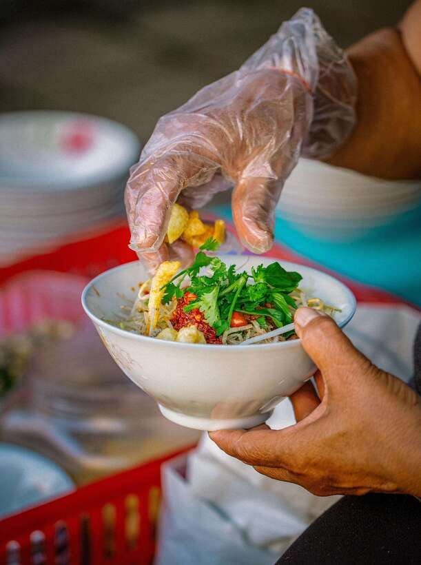 Hue: Guided Local Food Tour with Stories - Stop one: a small food shop on Phan Dinh Phung