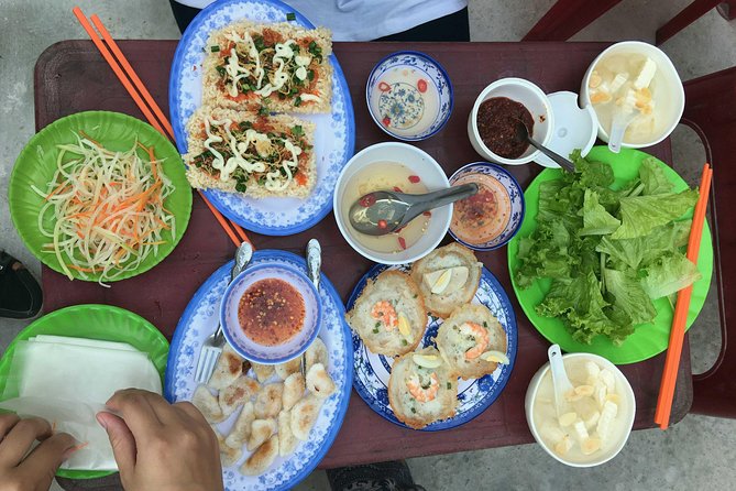 Hue Street Food Tour At Night By Scooter - Vietnamese BBQ and a local beer