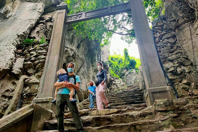 Lady Buddha, Marble Mountains, Coconut Jungle & Hoian City Tour - Marble Mountains caves, shrines, and stairs