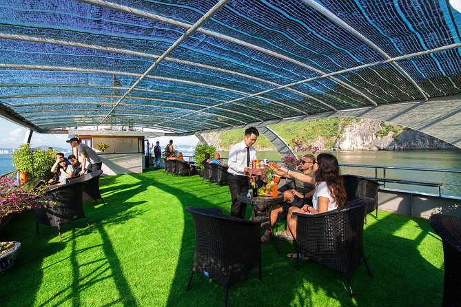 Luxury Halong Bay 1 Day on Cruises From Hanoi with Bus & Lunch - Titov Island, swimming, and bay views