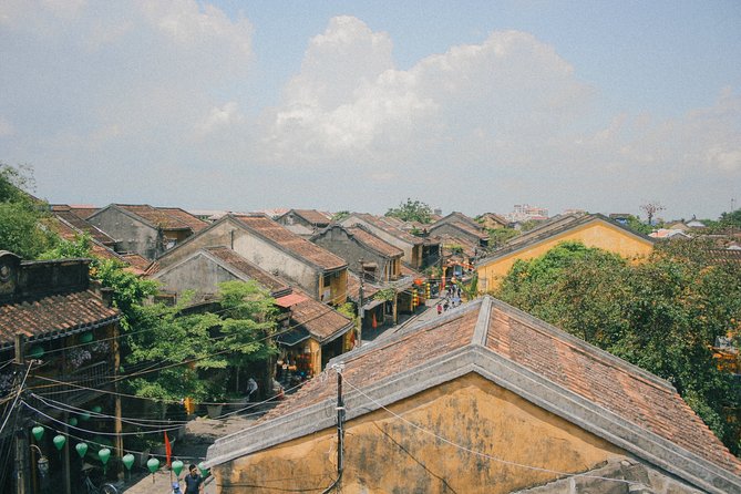 Marble Mountains - Hoi An Ancient Town Sunset Daily Ingroup Tour - Entering Hoi An as the lanterns come on