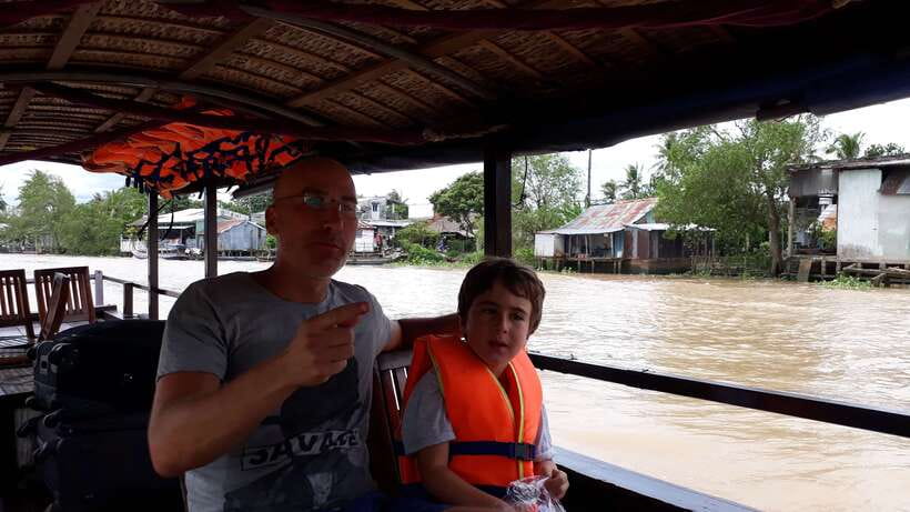 Mekong Day Tour by Car:Cai Be market, Local Island & Cycling - Cai Be by private boat, with coconut candy and honey tea