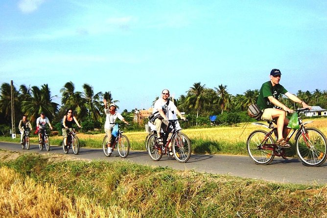 Mekong Delta 2-Day Tour: Floating Markets, Biking, Amazing Tour - Day one: My Tho, Ben Tre, and Vinh Trang Pagoda