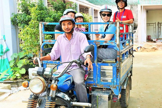 Mekong Delta Discovery Tour from Ho Chi Minh - Boarding the long-tail boat in My Tho