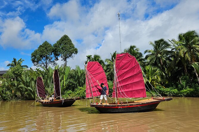 Mekong River Relaxing Sail boat cruise to Coconut Canals (1.5HRS) - The guide question: what you will and will not get