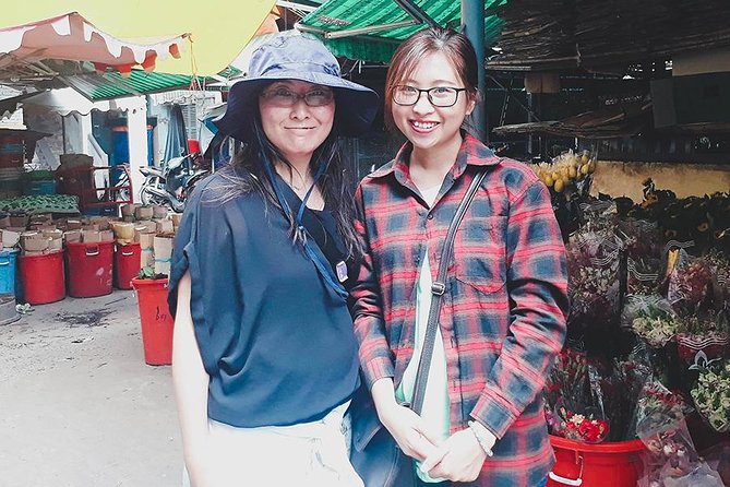 Morning Saigon Unseen+Street Food Tour with Ao Dai Riders Option - Coconut juice at a floating market