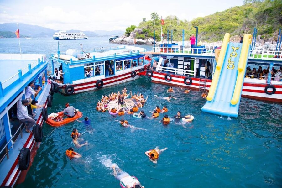 Nha Trang: Coral Reef Snorkeling and Floating Bar Party - Hon Tam: snorkeling, swimming, and optional thrills