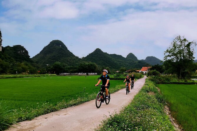 Ninh Binh 1 Day Tour(Tam Coc - Mua Cave - Bich Dong) - Climbing Mua Cave for the best view