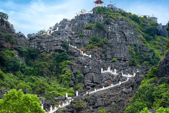 Ninh Binh Daily Tour: Hoa Lu -Mua Cave -Tam Coc- Bike-Swimming with Sunset Party - What the $79 price gives you
