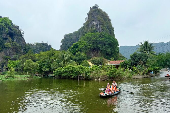 Ninh Binh Day Escape from Hanoi: Local Life, Connection & Tales - Tam Coc by traditional sampan