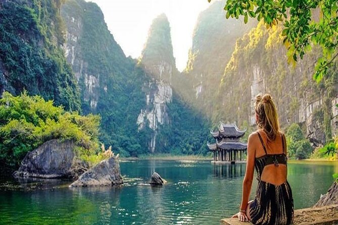 Ninh Binh Day Tour to Hoa Lu Trang An Mua Cave with Buffet Lunch - Cycling through villages or riding to Mua Cave