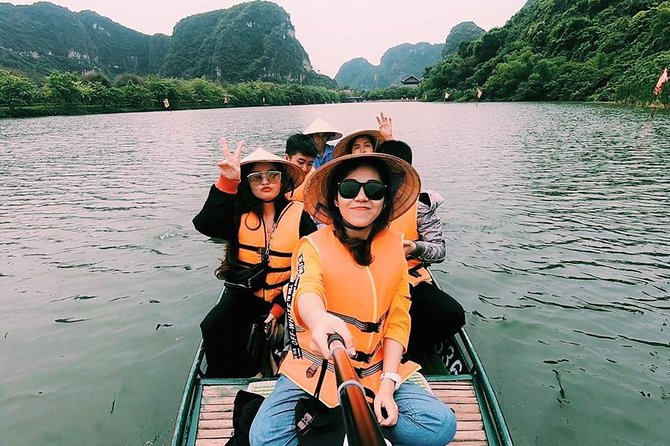 Ninh Binh Full Day Tour to Hoa Lu Tam Coc Mua Cave Buffet Lunch - Tam Coc by sampan, bicycle, and three grottoes