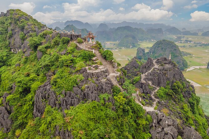 Ninh Binh Group Tour of 11 from Hanoi via Mua Cave Tam Coc Hoa Lu - A Vietnamese lunch around midday