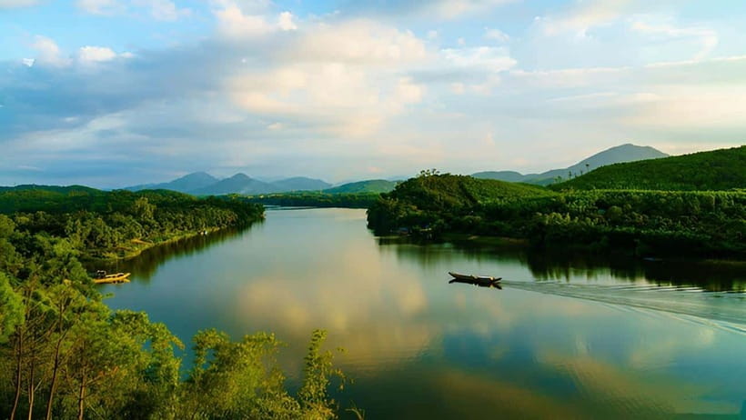 Official Hue: Dragon Boat, Imperial Citadel, & Market tour - Gliding along the Perfume River