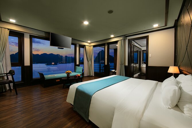 Peony Cruise 5<em> Halong Bay 3 days 2 nights with 2 ways transfer – Key things to know before you book’ /></p>
<ul>
<li><strong>Two nights on the bay:</strong> You get a fuller cruise experience than a standard overnight trip, with three days aboard Peony Cruise.</li>
<li><strong>Private balcony cabins:</strong> Every cabin includes its own balcony, useful for quiet time and early-morning views.</li>
<li><strong>Fast Hanoi transfer:</strong> The highway journey takes roughly 2.5 hours, with collection from Hanoi Old Quarter around 9:10 to 9:30 a.m.</li>
<li><strong>Early Tai Chi sessions:</strong> Morning activities begin at 6:00 or 6:15 a.m., so this trip suits early risers.</li>
<li><strong>Meals included:</strong> The package covers two breakfasts, two dinners, and three lunches.</li>
<li><strong>Weather matters:</strong> Poor weather can lead to a date change or a full refund, but ordinary cancellations are not refundable.</li>
</ul>
<h2>Why two nights make a difference in Halong Bay</h2>
<p><img width="669" height="446" decoding="async" src=