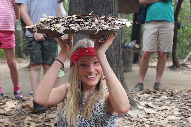 Premium Cu Chi Tunnels Tour with Local Expert by SpeedBoat - Walking through traps, bunkers, and restored tunnels