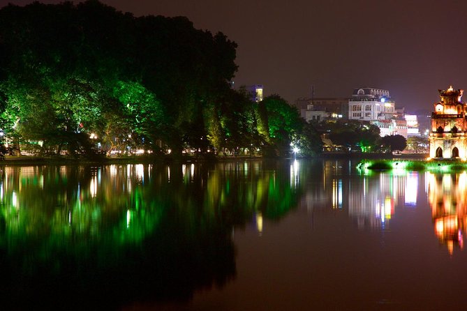 Private Evening Walking Tour - Cyclo & Water Puppet Show in Hanoi Old Quarter - Watching the 50-minute water puppet show