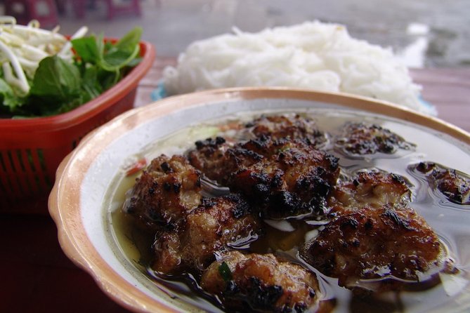 Private Hanoi Street Food Walking Tour With Real Foodie - Local food stalls and family restaurants