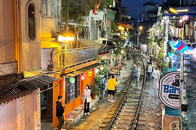 Private Unstoppable Gourmet Gastronomic Tour - A drink beside Hanoi’s railway