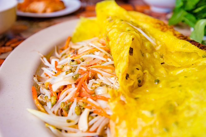 Private Vegan Food Tour By Scooter in Ho Chi Minh City - District 3 and the story behind the first stop