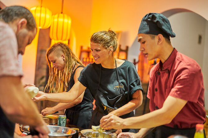 Rose Kitchen Hanoi: Market, Cooking & Culture Tour + Free PickUp - Cooking Vietnamese dishes in the garden villa