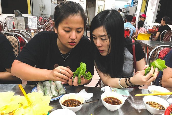 Saigon Afternoon Unseen Street Food by Scooter |Opt: Ao Dai Rider - District 4, local food, and the so-called mafia area