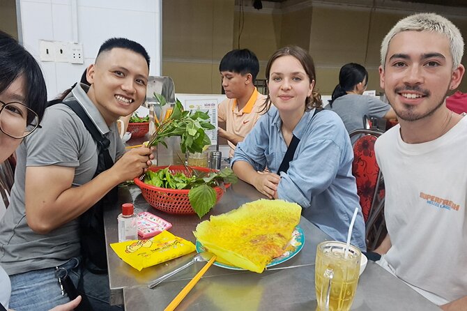 Saigon Food Tour by Scooter with Eleven Tastings - Ho Thi Ky Flower Market adds color and strong street food