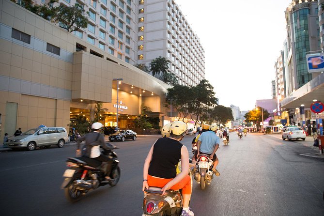 Saigon Food Tour on Scooter at Night - Meeting your guide and settling onto the scooter