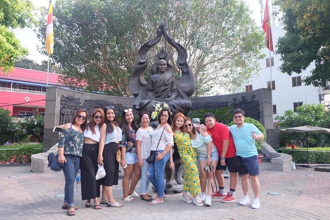 Saigon Morning City Historical Scooter Tour w Ao Dai Rider option - The Opera House and Nguyen Hue Street