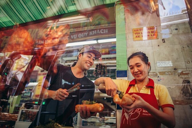 Saigon Night Bites on Foot: Local Vendors, Stories & Sweet Finish - Walking past Chua Ba Thien Hau