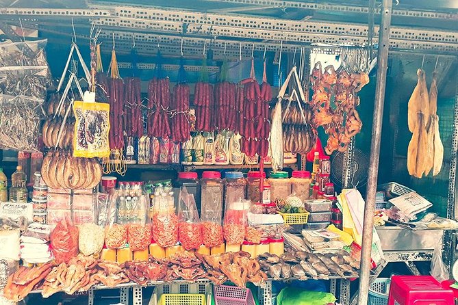 Saigon Night Sights & Local Food by Motorbike| Opt: Ao Dai Riders - District 4 brings the local food focus