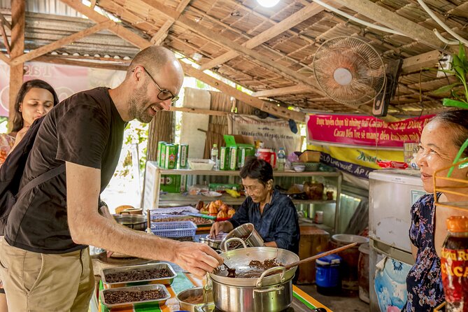 Small-Group Mekong Delta Day Trip: Boat Ride, Cottages & Pagoda - Vinh Trang Pagoda and the Ride Back