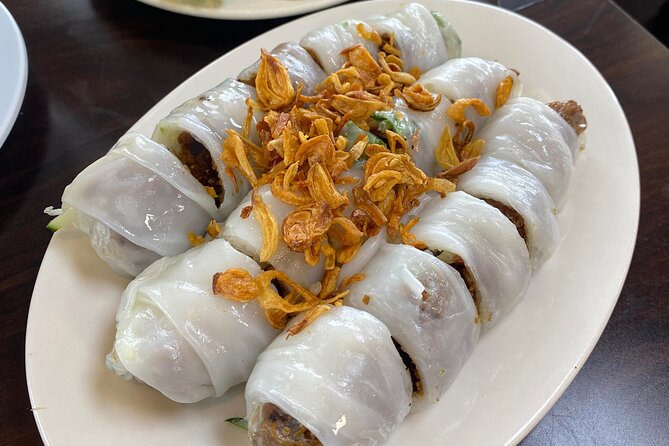 Super Niche Walking Street Food Tour in Ho Chi Minh City - Ho Thi Ky Flower Market: a change of scenery between bites