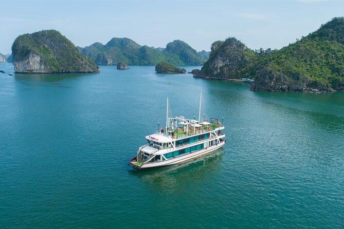 Sweetness Cruise Ha Long Bay: Caves, Kayaking, Swimming & Lunch - The return cruise, sunset fruit, and jacuzzi