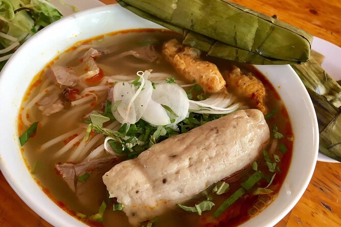 Top Notch Street Food Motorbike Tour In Ho Chi Minh City - Bo kho near Ban Co Market