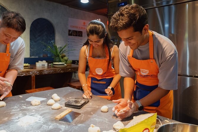 Vietnamese Bread & Brew: Banh Mi Baking Class & Specialty Coffee - Sitting down to eat what you made
